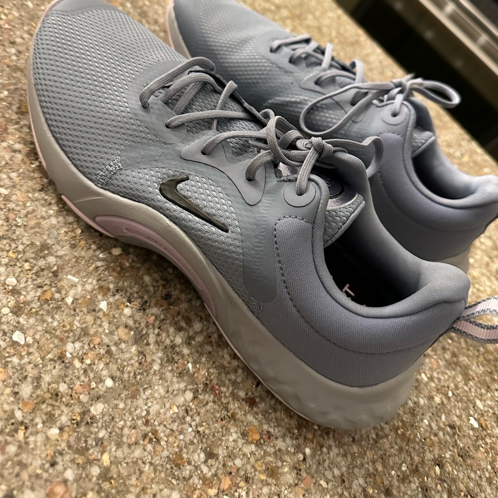 Gray Nike tennis shoes. Size 9 women's